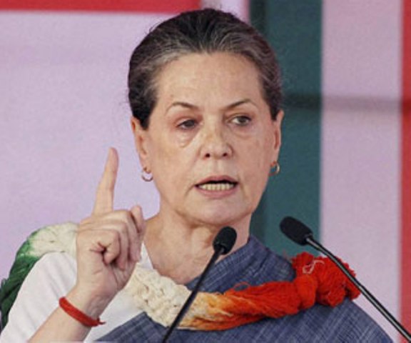 sonia_gandhi_modi_kisan_rally_niharonline